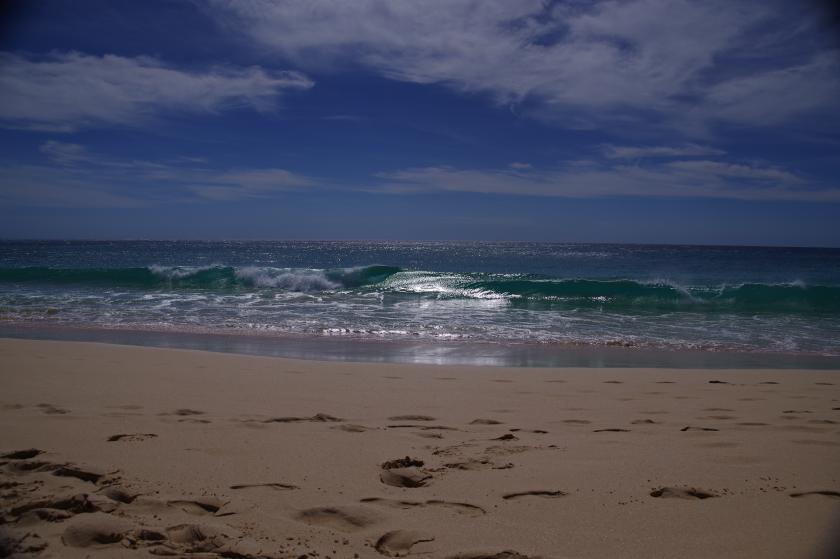 Reflectie van de zon in de zee.